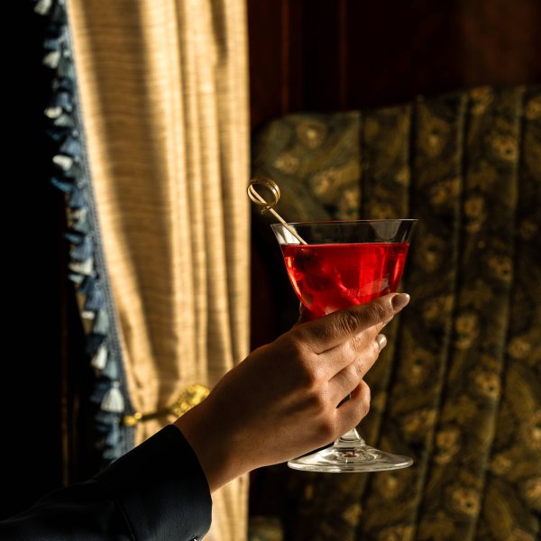 Cocktail with hand small www.glenloabbeyhotel.ie